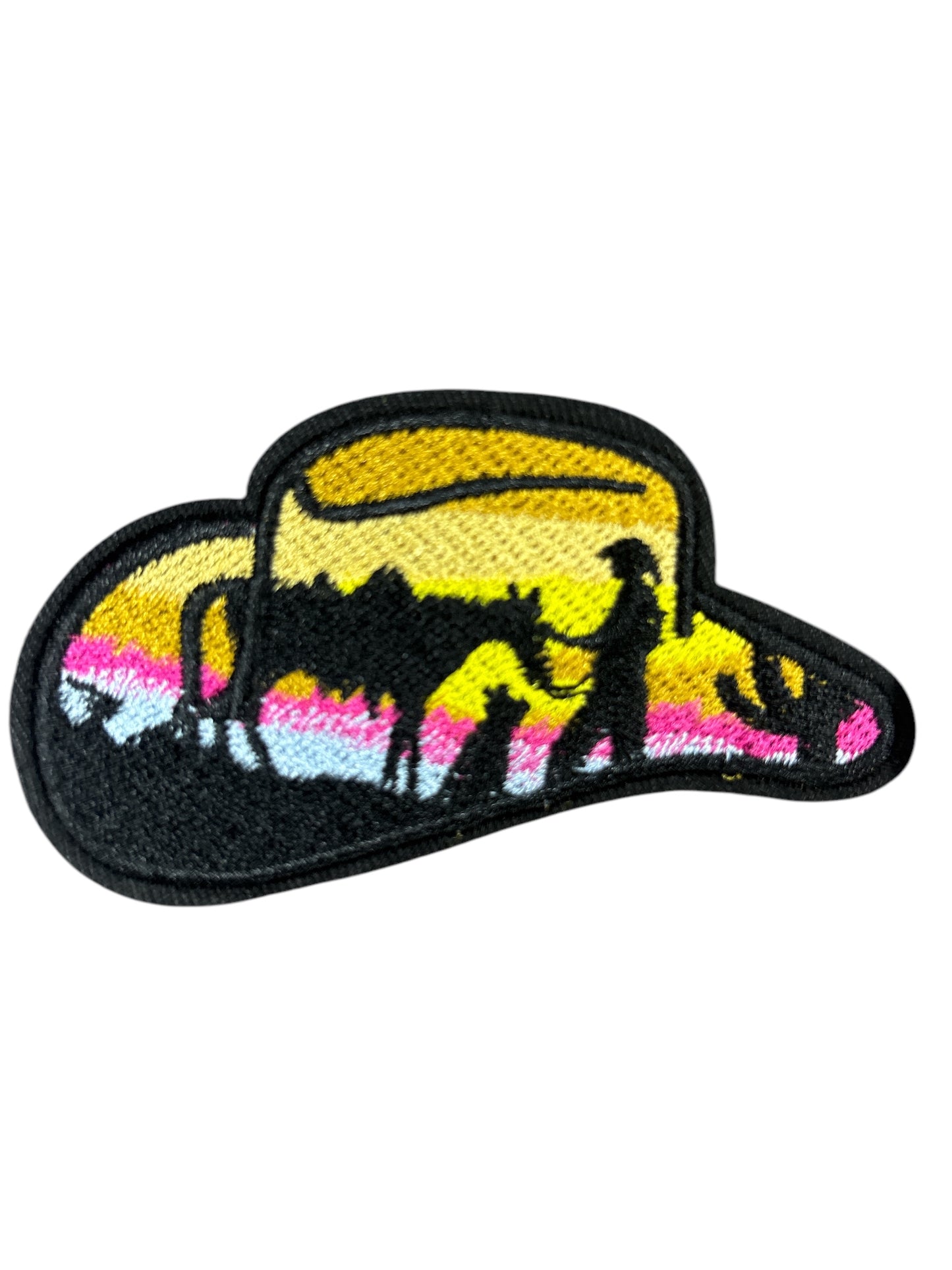 Western cowgirl in sunset cowboy hat patch