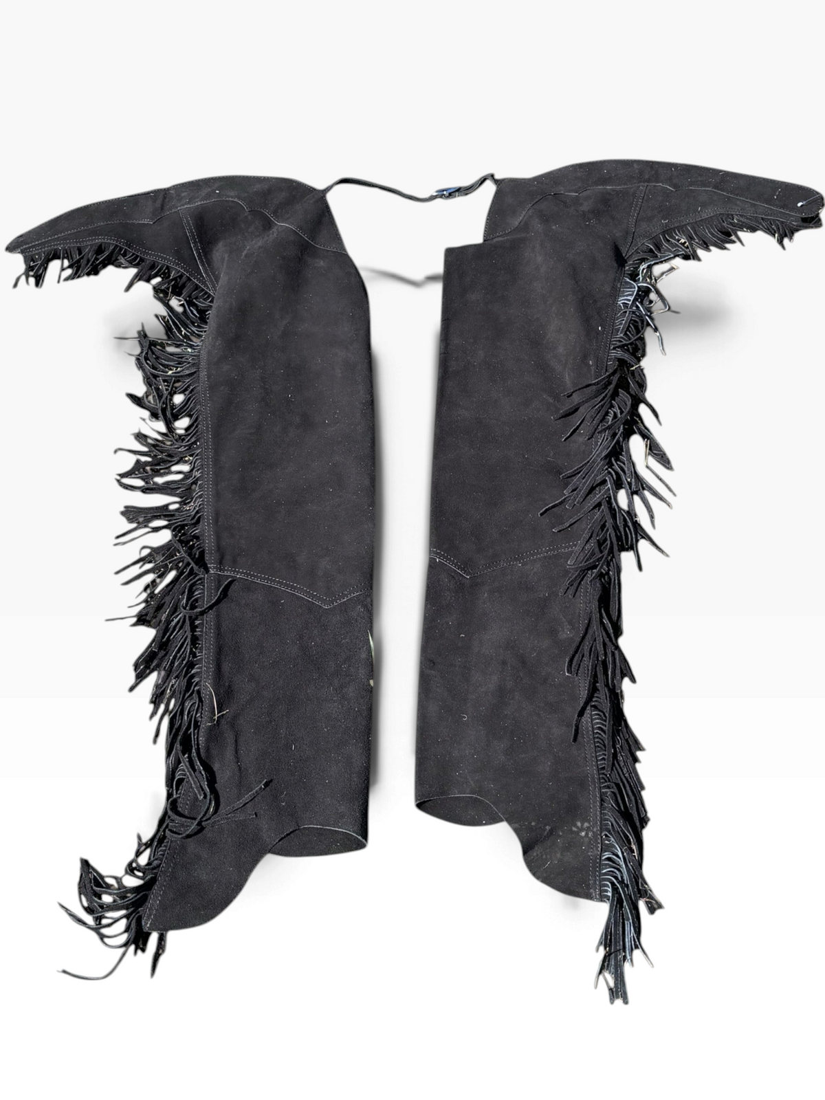 Clarabeths black suede leather western chaps featuring long fringe detailing and an adjustable waist closure.