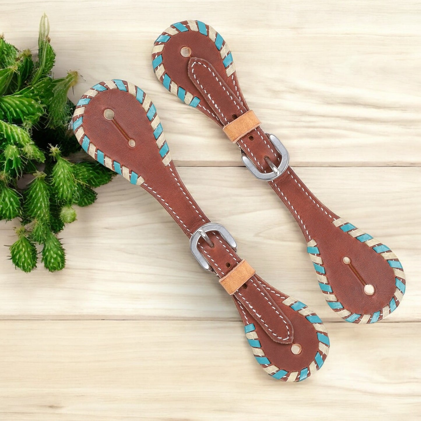 Showman Ladies Argentina Cow Leather Spur Strap with White and Teal Rawhide